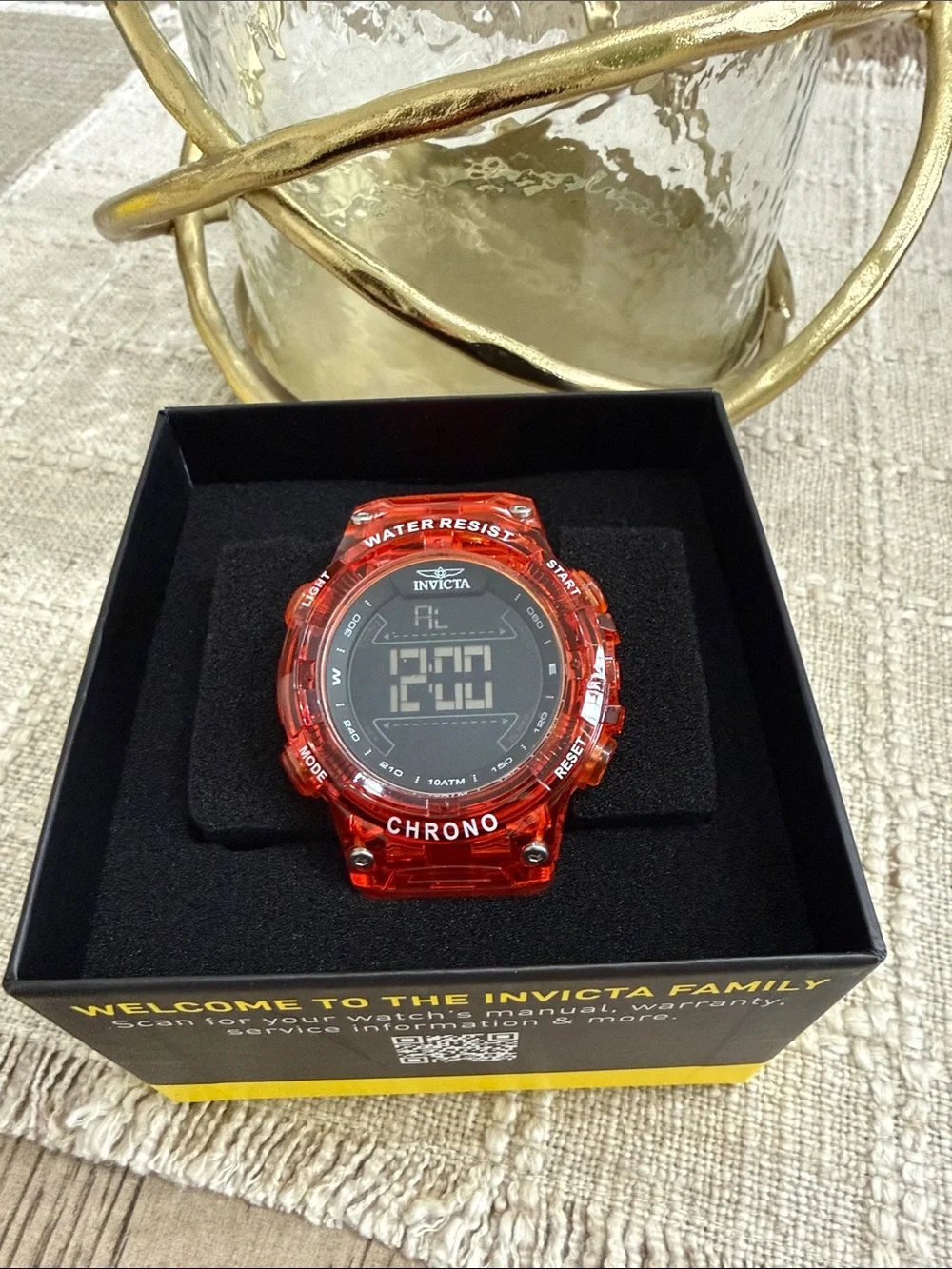 Invicta translucent orange digital chronograph watch